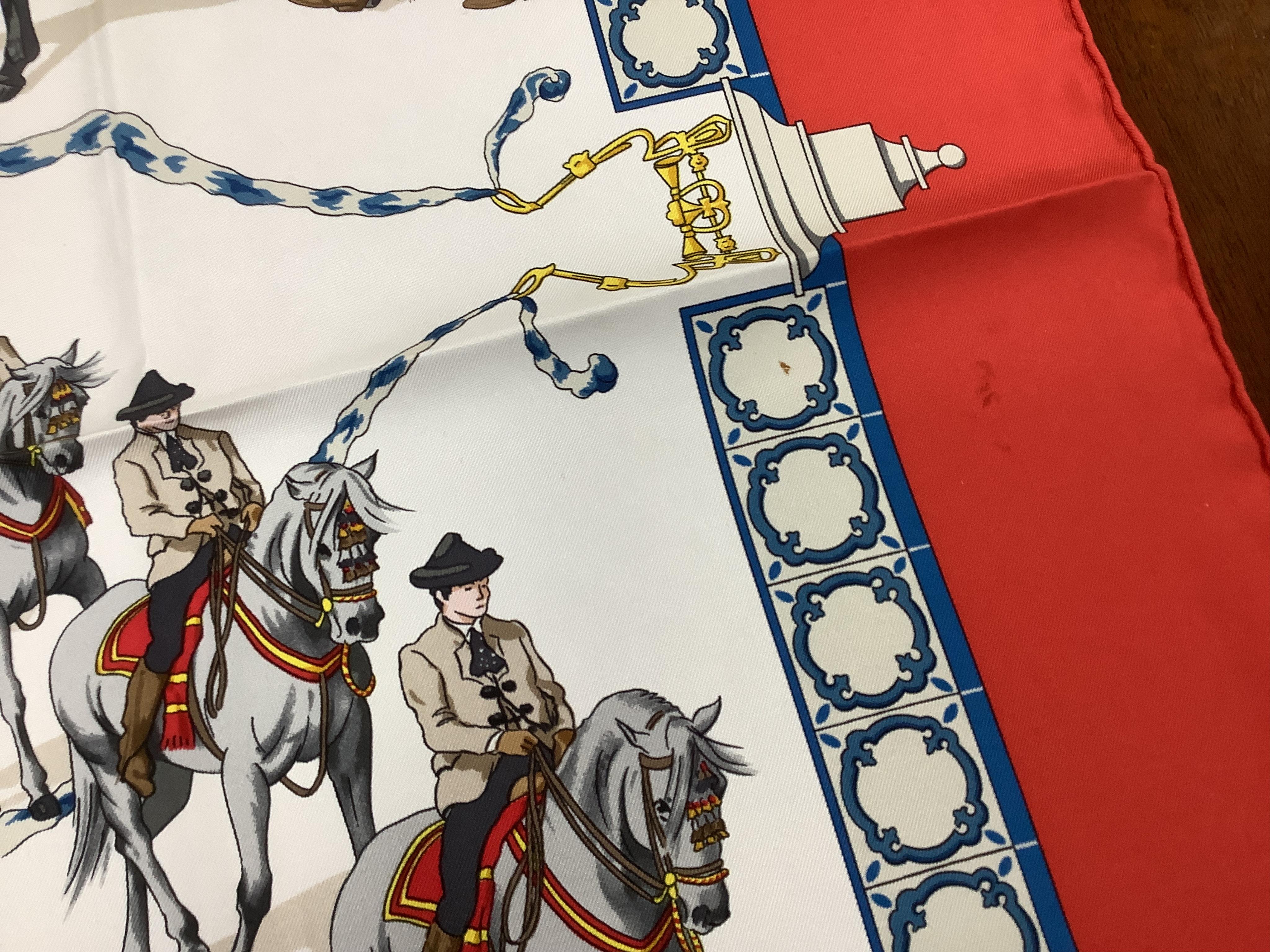 Two boxed Hermes silk scarves comprising ‘Real Escuela Andaluza del Arte Equestre’ and ‘Equateur’, with original boxes, together with four Hermes gentleman’s silk ties